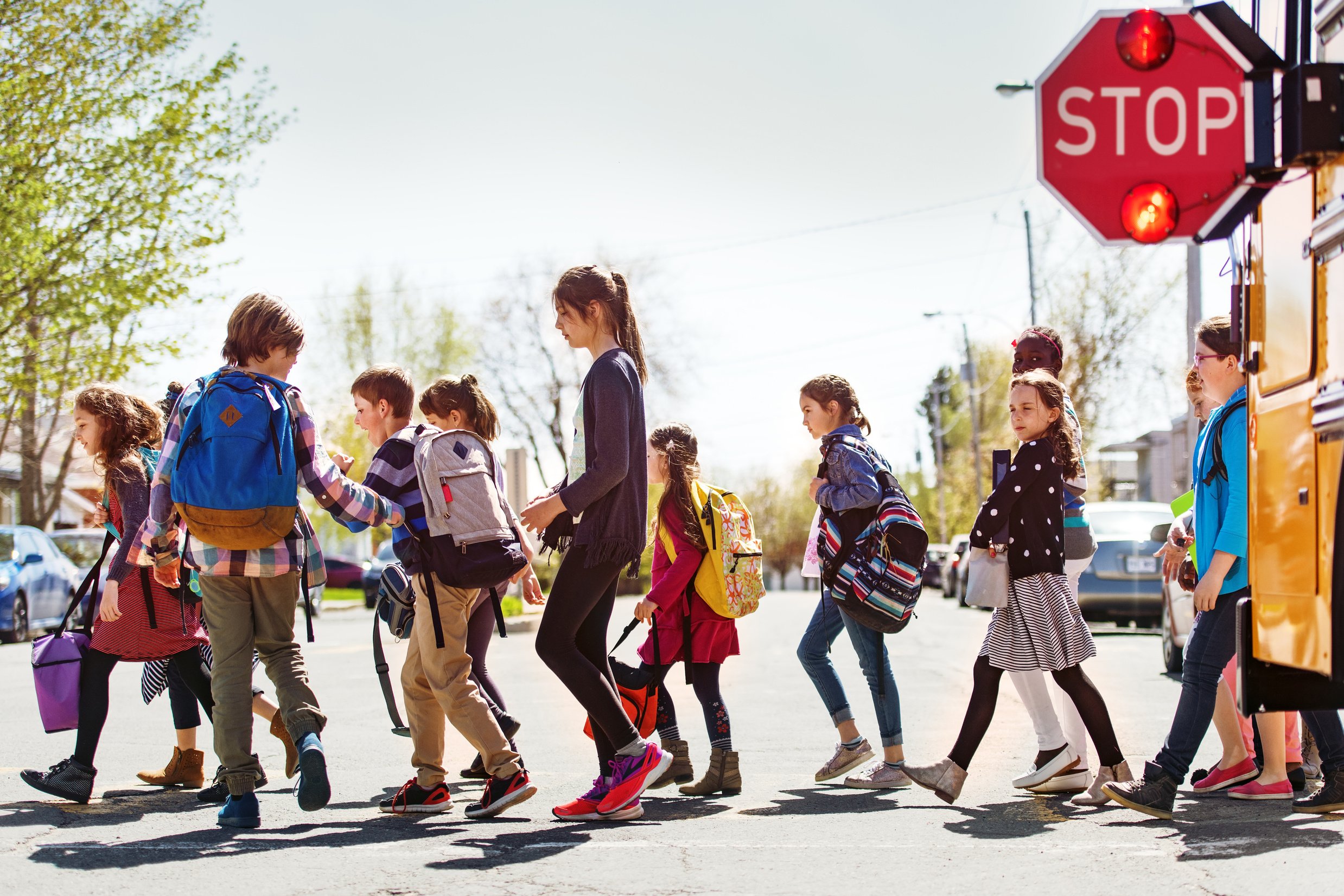 School kids crossing street